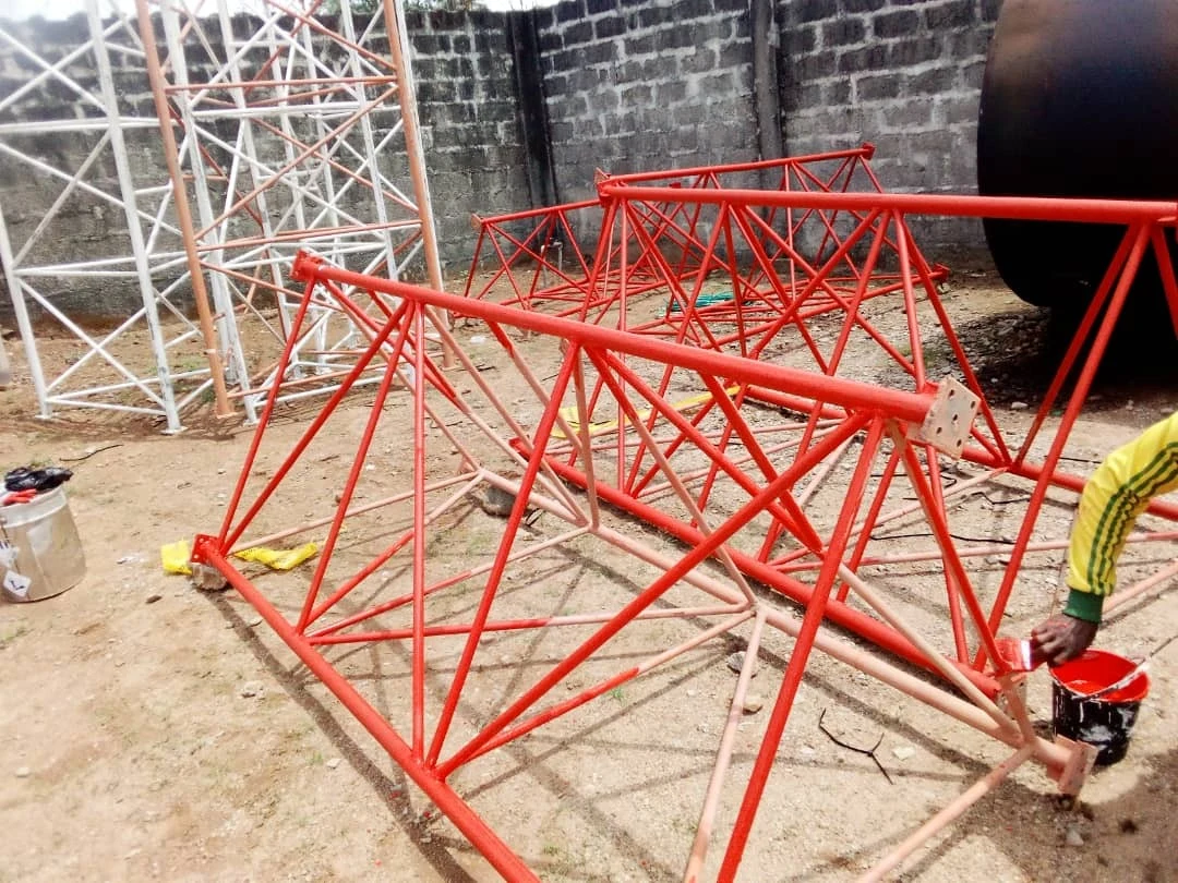 Steel telecommunications tower sections prepared for assembly
